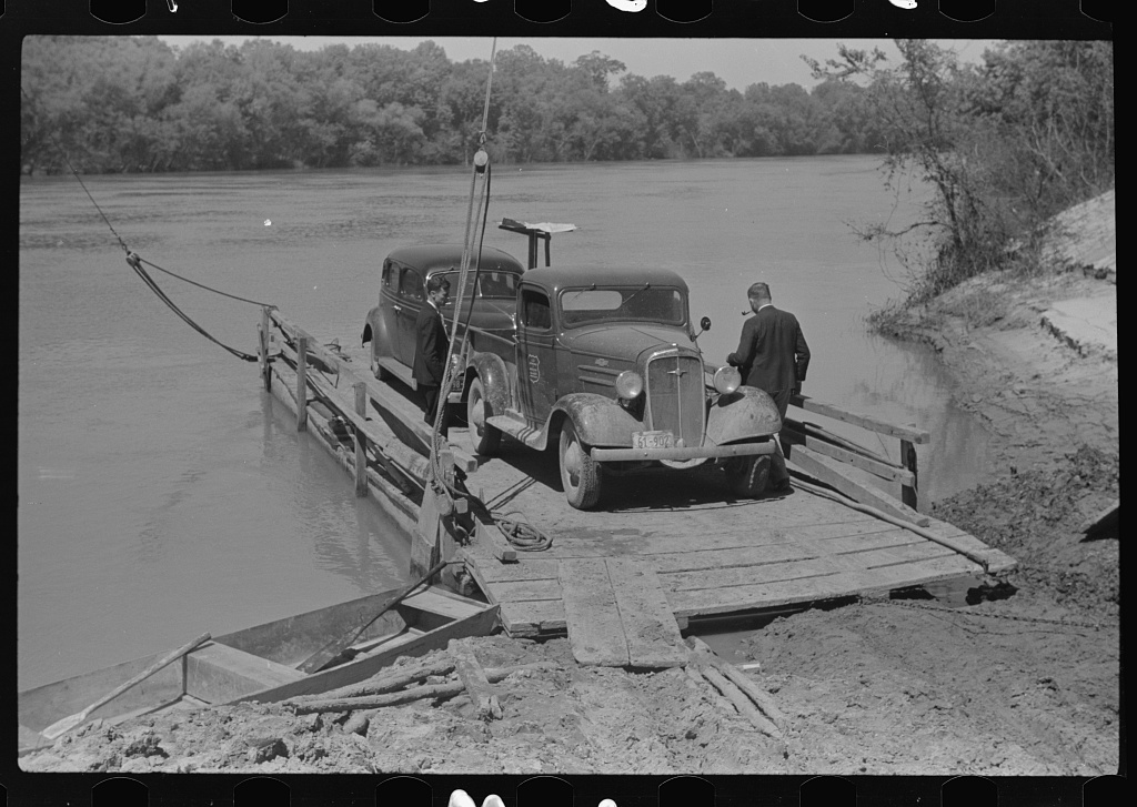 Project manager's truck coming across on ferry from Camden to Gees Bend, Alabama